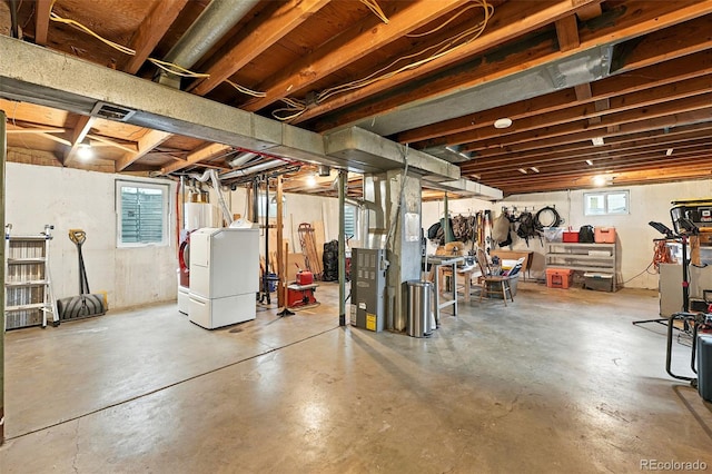 2011 S Vallejo St, Denver, CO 80223 - below grade area with washer / clothes dryer, water heater, and heating unit