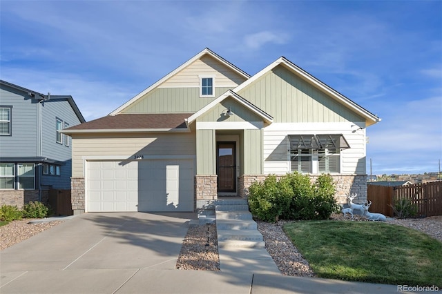 3278 Ghost Dance Dr, Castle Rock, CO 80108 - craftsman inspired home featuring driveway, stone siding, board and batten siding, and a garage