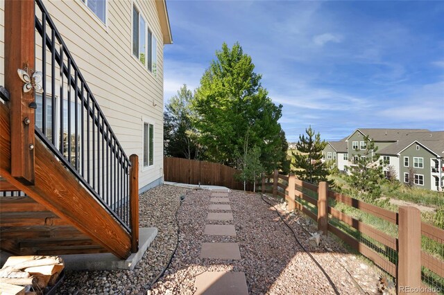 3278 Ghost Dance Dr, Castle Rock, CO 80108 - fenced backyard featuring a residential view