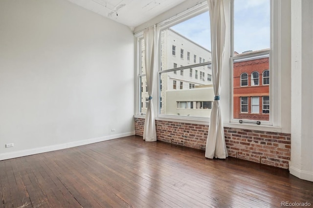 720 16th St Unit 306, Denver, CO 80202 - empty room with hardwood / wood-style flooring and baseboards