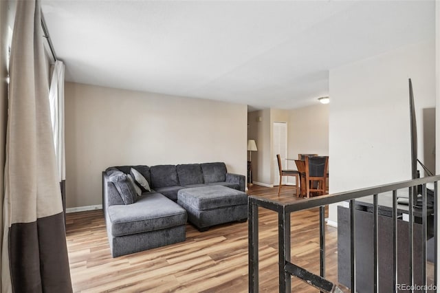 living room with light hardwood / wood-style floors