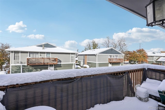 view of snow covered deck