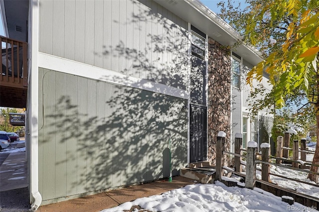 view of snow covered property