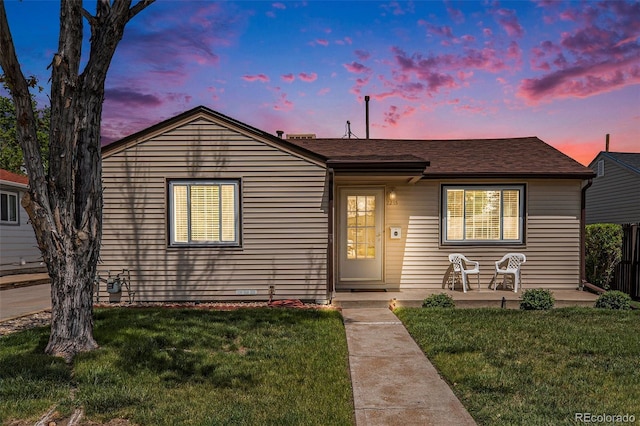 2235 W 46th Ave, Denver, CO 80211 - view of front of house with a front lawn and a shingled roof