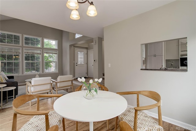 8652 Aberdeen Cir, Highlands Ranch, CO 80130 - dining space with baseboards and wood finished floors