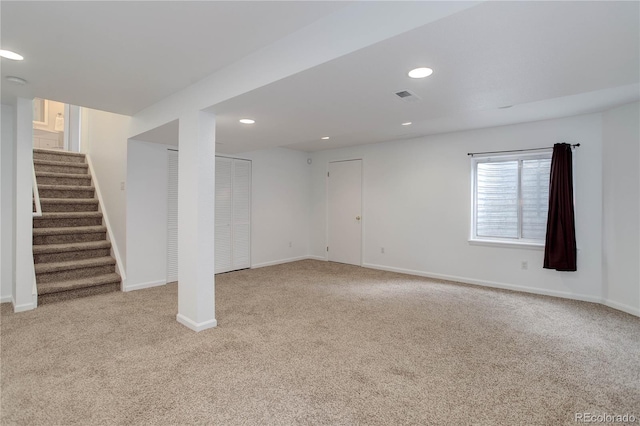 8652 Aberdeen Cir, Highlands Ranch, CO 80130 - basement with carpet floors, stairs, baseboards, and recessed lighting