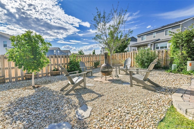 109 N Patsburg St, Aurora, CO 80018 - fenced backyard with a fire pit