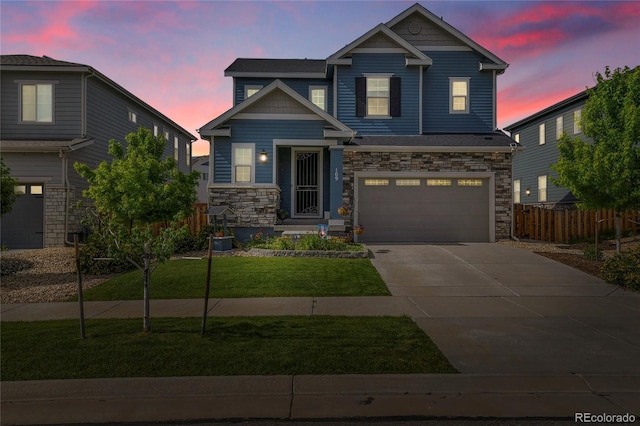 109 N Patsburg St, Aurora, CO 80018 - craftsman house featuring a garage, stone siding, and driveway