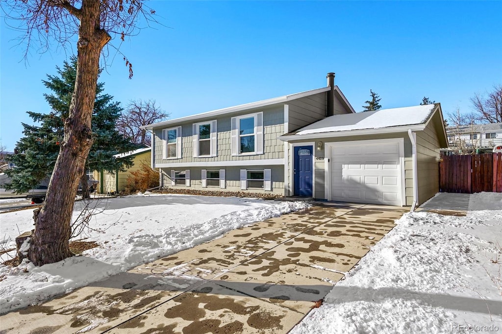 view of front of property featuring a garage