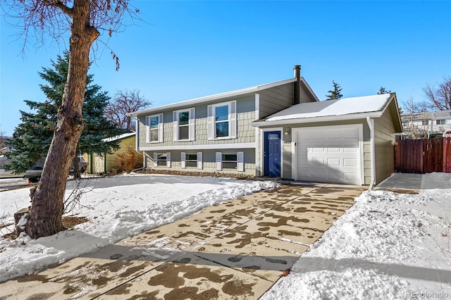 view of front of property featuring a garage