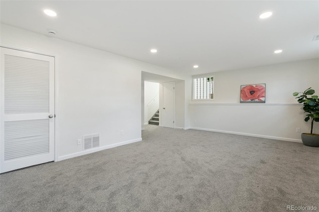 empty room with carpet flooring