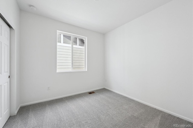 1242 Penner Dr, Erie, CO 80026 - unfurnished bedroom featuring visible vents, carpet, a closet, and baseboards