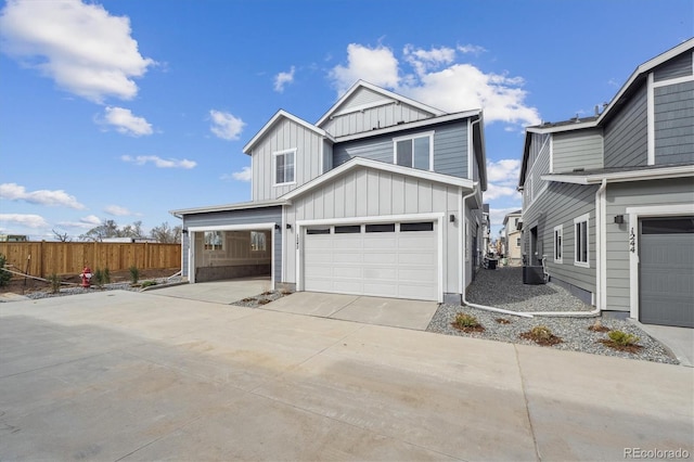 1242 Penner Dr, Erie, CO 80026 - view of front facade featuring central air condition unit, fence, an attached garage, board and batten siding, and driveway