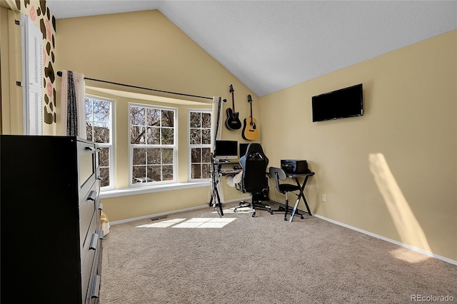 exercise area featuring baseboards, vaulted ceiling, carpet flooring, and visible vents