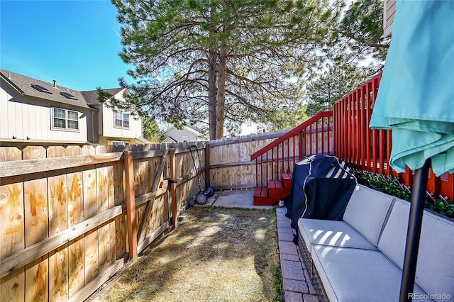 view of yard featuring a fenced backyard and a patio area