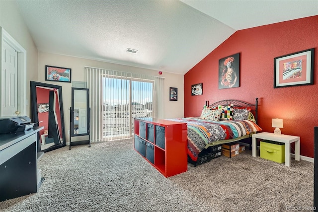18084 Becket Dr, Parker, CO 80134 - carpeted bedroom with access to outside, vaulted ceiling, a textured wall, and a textured ceiling