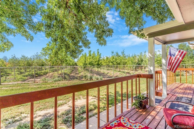 7887 York St Unit 1, Denver, CO 80229 - wooden deck with a fenced backyard