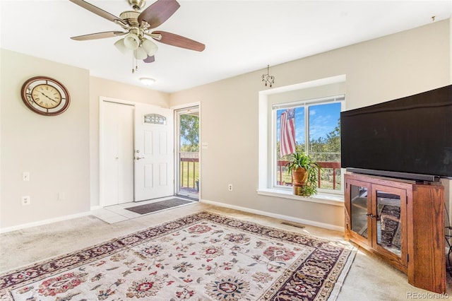 7887 York St Unit 1, Denver, CO 80229 - entrance foyer with carpet and a ceiling fan