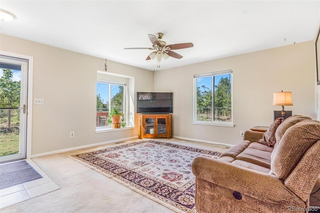7887 York St Unit 1, Denver, CO 80229 - living area with healthy amount of natural light, carpet flooring, and a ceiling fan