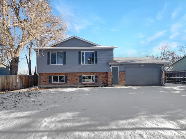 tri-level home featuring a garage