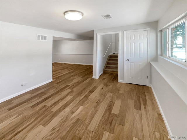 spare room with light wood-type flooring