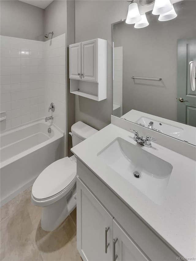 bathroom with shower / tub combination, vanity, and toilet