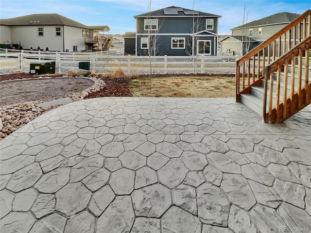 exterior space with fence private yard and a residential view