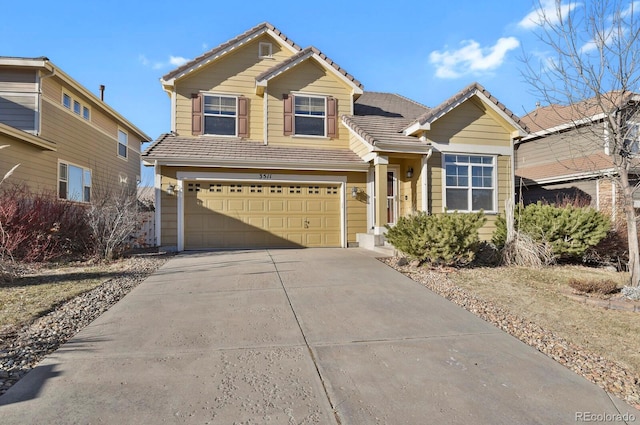 view of front of property with a garage