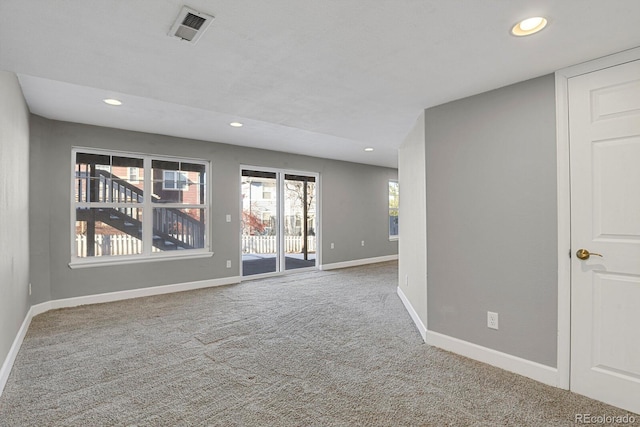 view of carpeted spare room