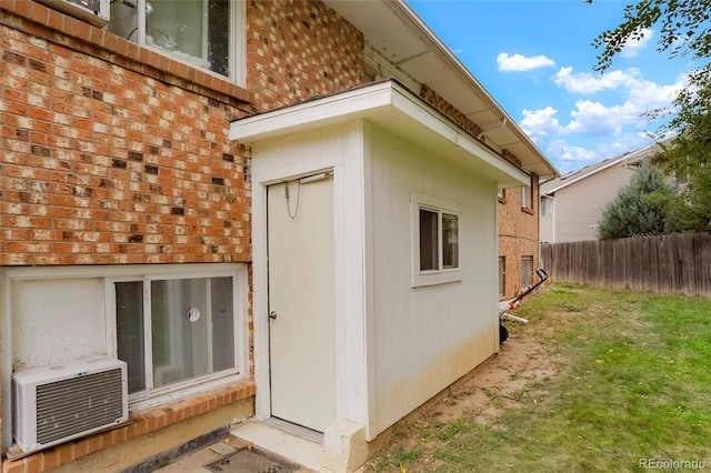 view of side of home featuring a yard