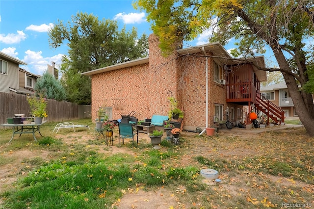 view of side of home featuring a patio