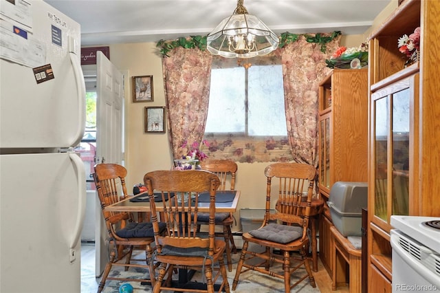 dining room featuring an inviting chandelier