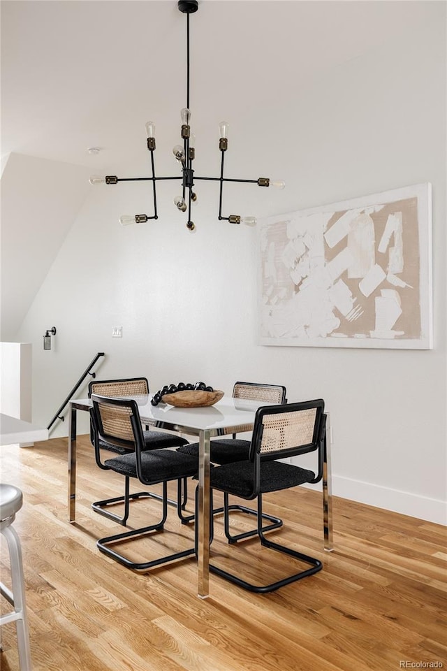 3308 W 17th Ave, Denver, CO 80204 - dining room with a chandelier and wood finished floors