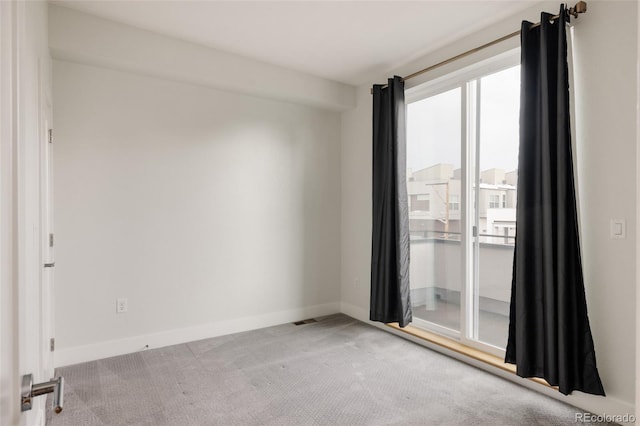 3308 W 17th Ave, Denver, CO 80204 - unfurnished room with carpet flooring and baseboards