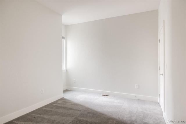 3308 W 17th Ave, Denver, CO 80204 - empty room with light carpet and baseboards