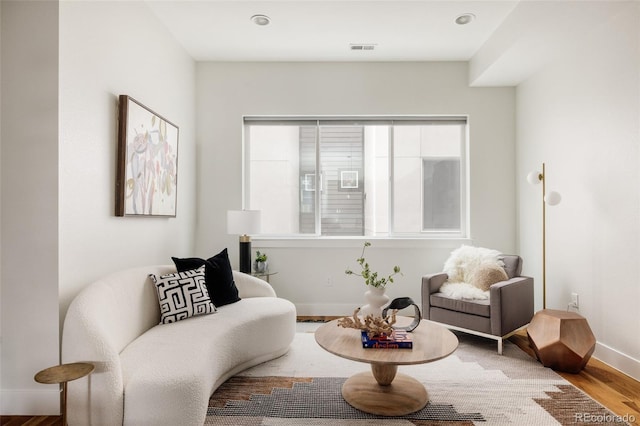 3308 W 17th Ave, Denver, CO 80204 - sitting room with wood finished floors and baseboards