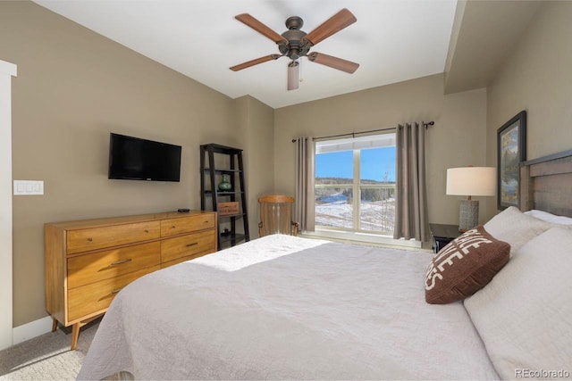 bedroom featuring ceiling fan and baseboards