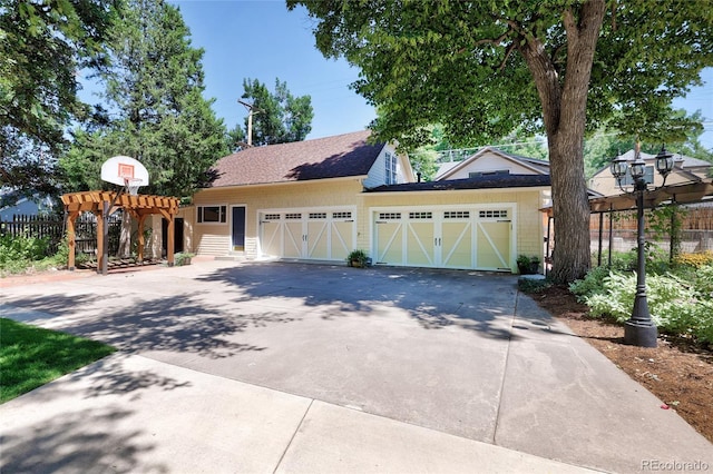 view of front of property featuring a garage