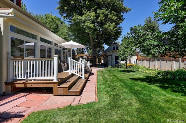 view of yard with a wooden deck