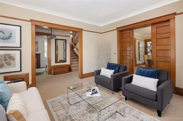 living room featuring ornamental molding and light colored carpet