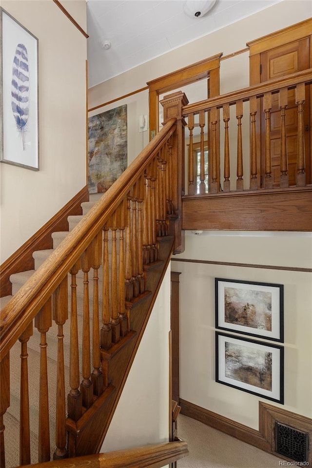 stairway with carpet floors