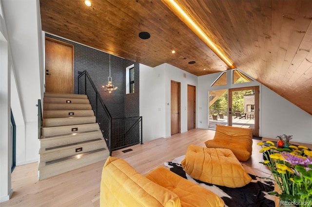365 Bow Mountain Rd, Boulder, CO 80302 - living room with wood ceiling, wood finished floors, vaulted ceiling, stairway, and a chandelier