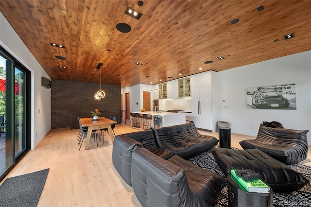 365 Bow Mountain Rd, Boulder, CO 80302 - living area with wooden ceiling, light wood finished floors, a wall mounted AC, and recessed lighting