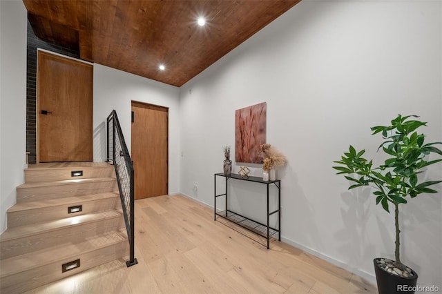 365 Bow Mountain Rd, Boulder, CO 80302 - entryway featuring stairway, light wood-style flooring, wood ceiling, vaulted ceiling, and recessed lighting