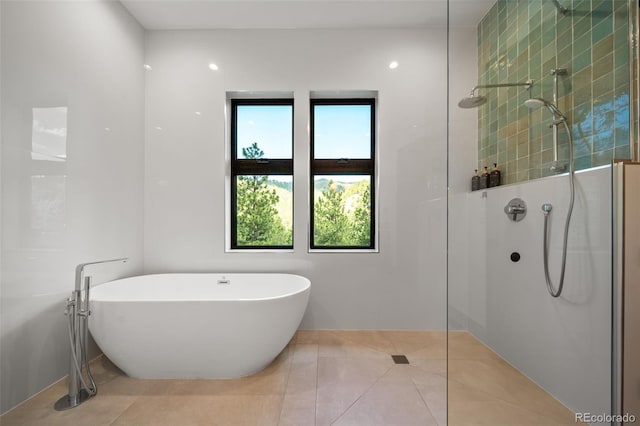 365 Bow Mountain Rd, Boulder, CO 80302 - full bathroom featuring a freestanding bath, walk in shower, and tile patterned floors