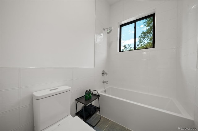 365 Bow Mountain Rd, Boulder, CO 80302 - bathroom with tile walls and bathtub / shower combination