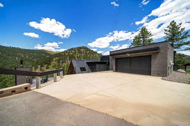 365 Bow Mountain Rd, Boulder, CO 80302 - garage with a mountain view and driveway
