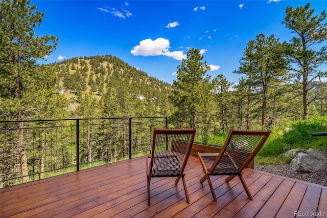 365 Bow Mountain Rd, Boulder, CO 80302 - wooden terrace with a mountain view and a view of trees