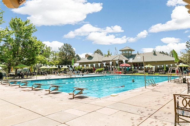 pool featuring a patio area