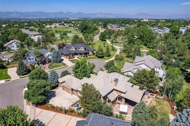 bird's eye view featuring a residential view and a mountain view